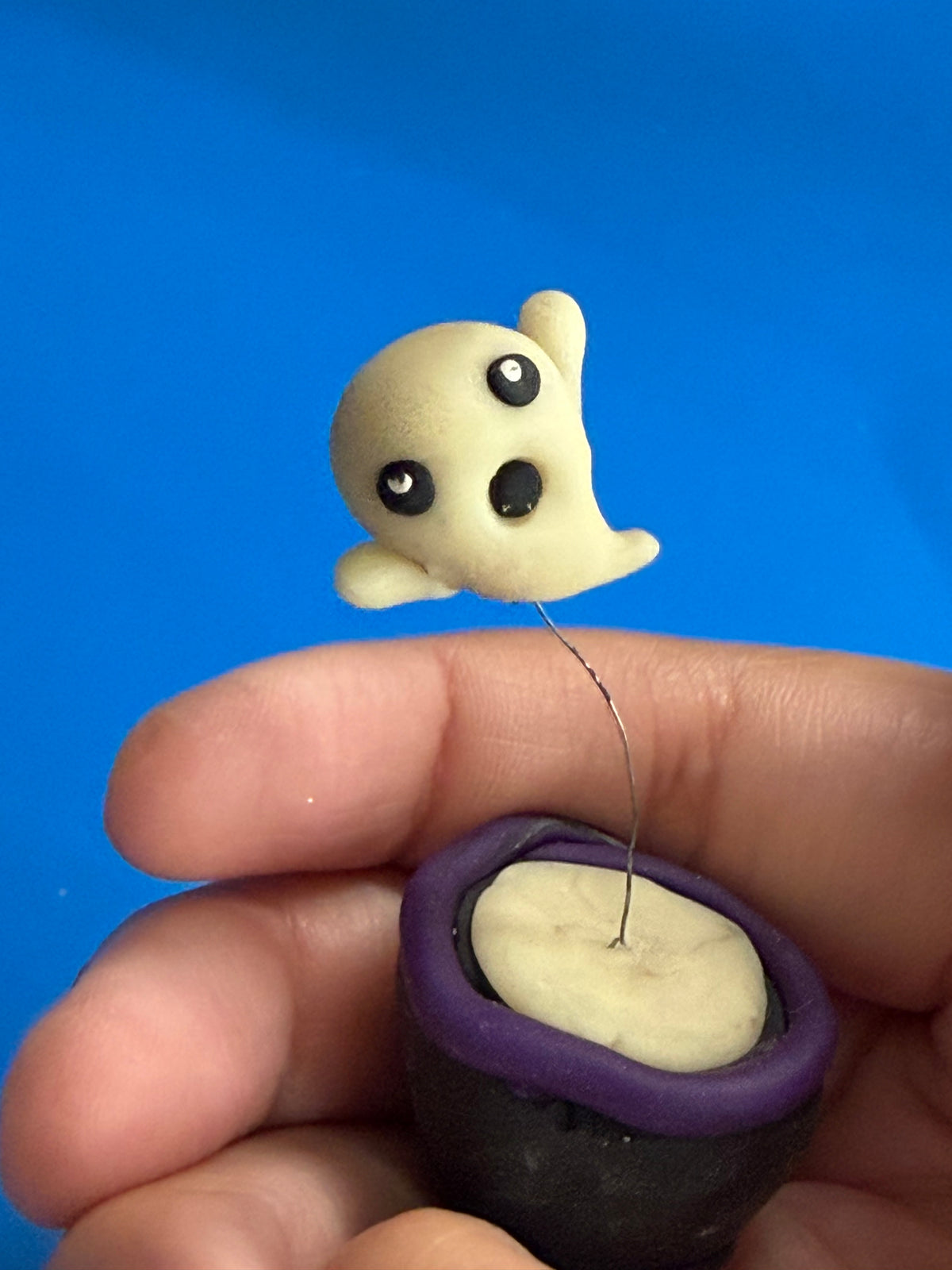 Glow-in-the-dark ghost desk buddy